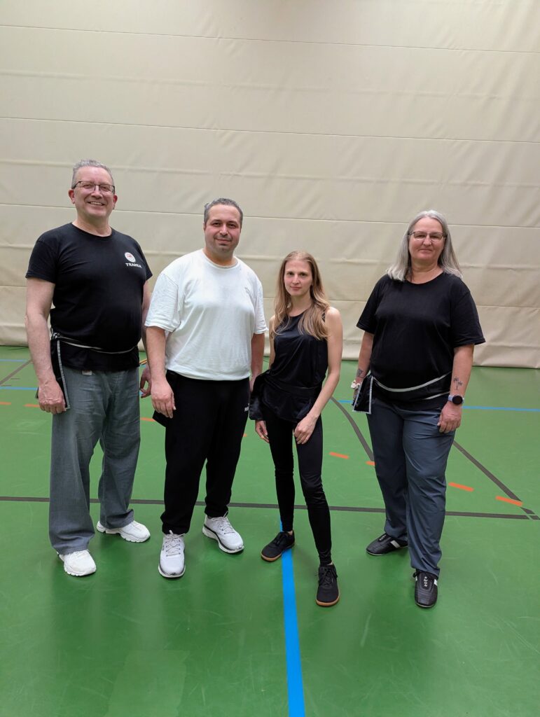 Schüler und Trainer nach SV Prüfung mit Belastung