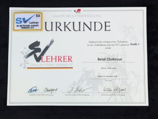 Die Urkunde und der Aufnäher als Nachweis der erfolgreichen Teilnahme an der SV-Lehrerausbildung Stufe 3 Gold.